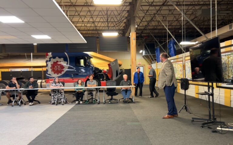Dennis Geipel, District Sales Manager for Optimus Technologies, addresses attendees at Peaslee Technical Training Center in Lawrence, Kansas, during the October 7 announcement of a new B100 biodiesel technician training program.